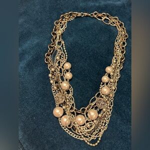 Elegant Silver and Pearl Multi-Strand Necklace